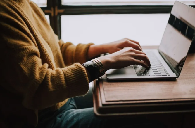 Student learning on laptop