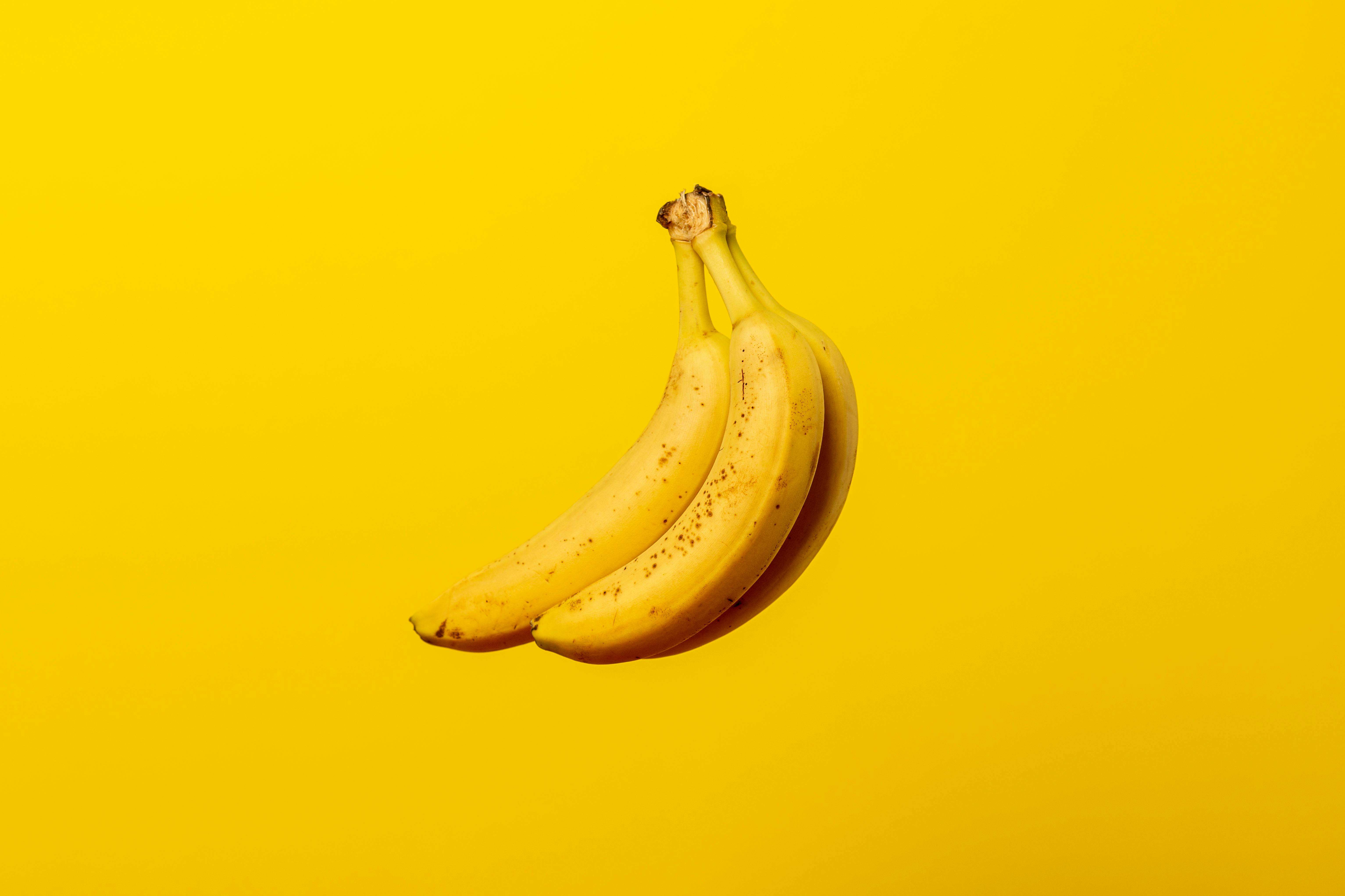 Banana on yellow background